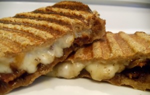 Gruyere, Fotina and aged raw-milk Cheddar top this panini with a nice layer of onion bacon jam! You must try this! #Real Food Gril: Unmodified