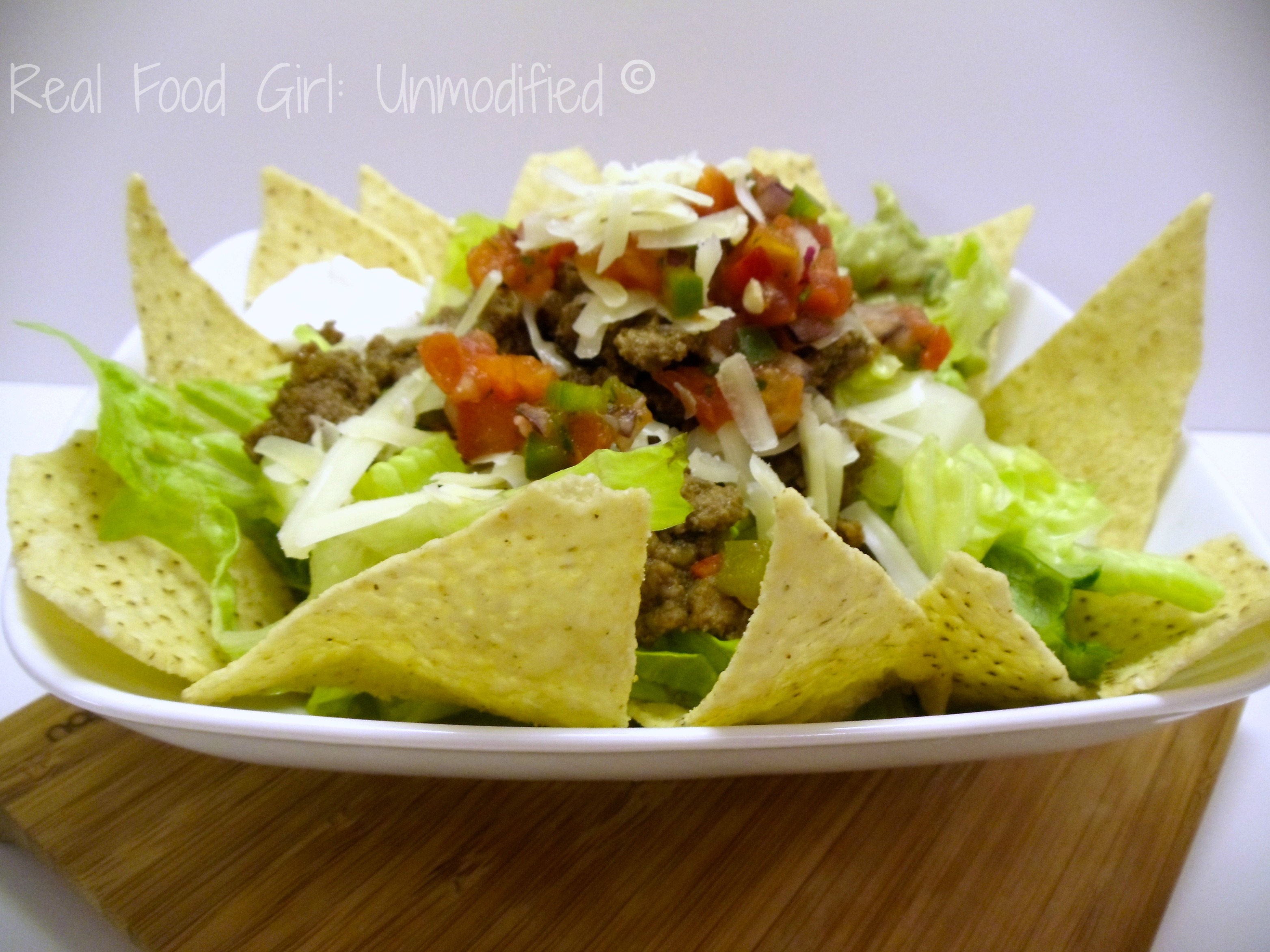 GMO-Free Tasty Taco Salad. Super flavorful taco meat made with organic grass fed beef, and fresh veggies! Perfect weeknight meal. Real Food Girl: Unmodified