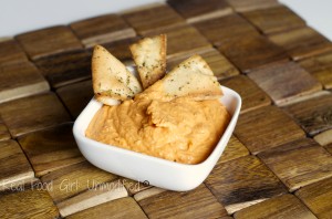 Delicious roasted red pepper hummus with homemade pita chips. Easy and affordable. You'll never buy store bought again! @Real Food Girl: Unmodified